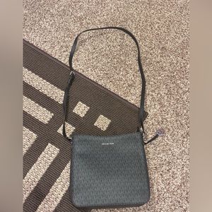 Never used brand new Micheal Kors shoulder bag with wallet included